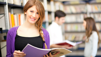 female student holding books